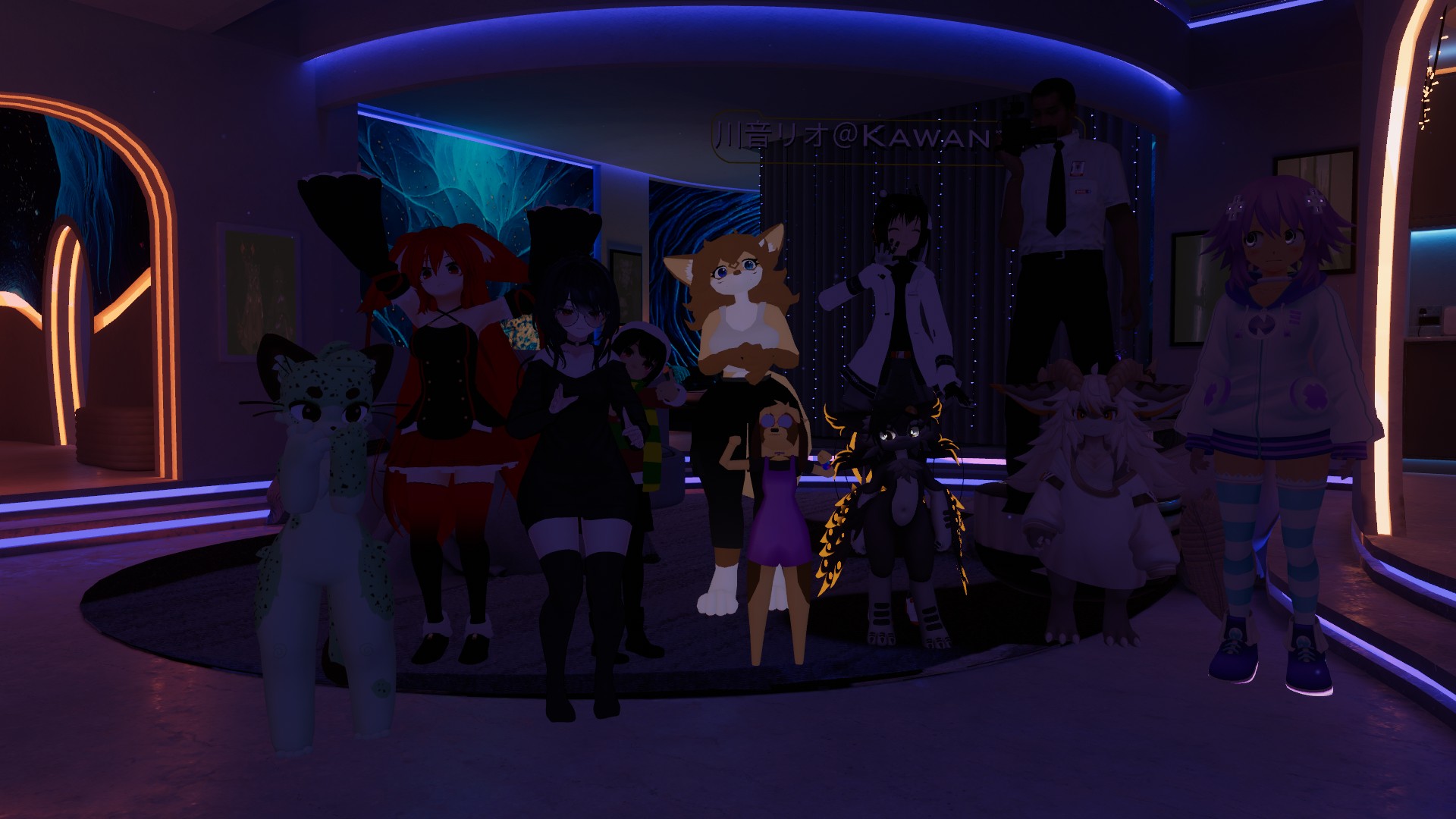 The image depicts a group of eleven diverse avatars in a dimly lit, futuristic or club-like indoor setting from VRChat. The lighting is predominantly purple and blue, with some orange accents from glowing architectural elements. From left to right: A light green and dark spotted feline-like avatar with large ears and a small muzzle, standing on two legs; A character with long red hair, wearing a black and red dress; A dark-haired anime-style female avatar wearing a black dress and thigh-high stockings, with glasses and a choker; Behind the dark-haired avatar, a smaller character with a yellow and green striped scarf and a white hat is partially visible; A light brown fox-like or cat-like avatar with white fur on its chest and belly, standing with arms crossed; Below the fox-like avatar, a smaller, slender avatar with brown skin, wearing a purple dress and large, round sunglasses; A character with dark hair and a white jacket, waving; A tall, dark-skinned humanoid avatar in a white short-sleeved collared shirt and black tie, holding what looks like a camera to his face; A dark, creature-like avatar with glowing orange or yellow accented fur on its arm wings and head; A white, fluffy, bipedal creature with horns and a long tail, wearing a white sweater; On the far right, an anime-style female avatar with purple hair, wearing a white and purple hooded jacket, a short skirt, and blue and white striped thigh-high stockings.